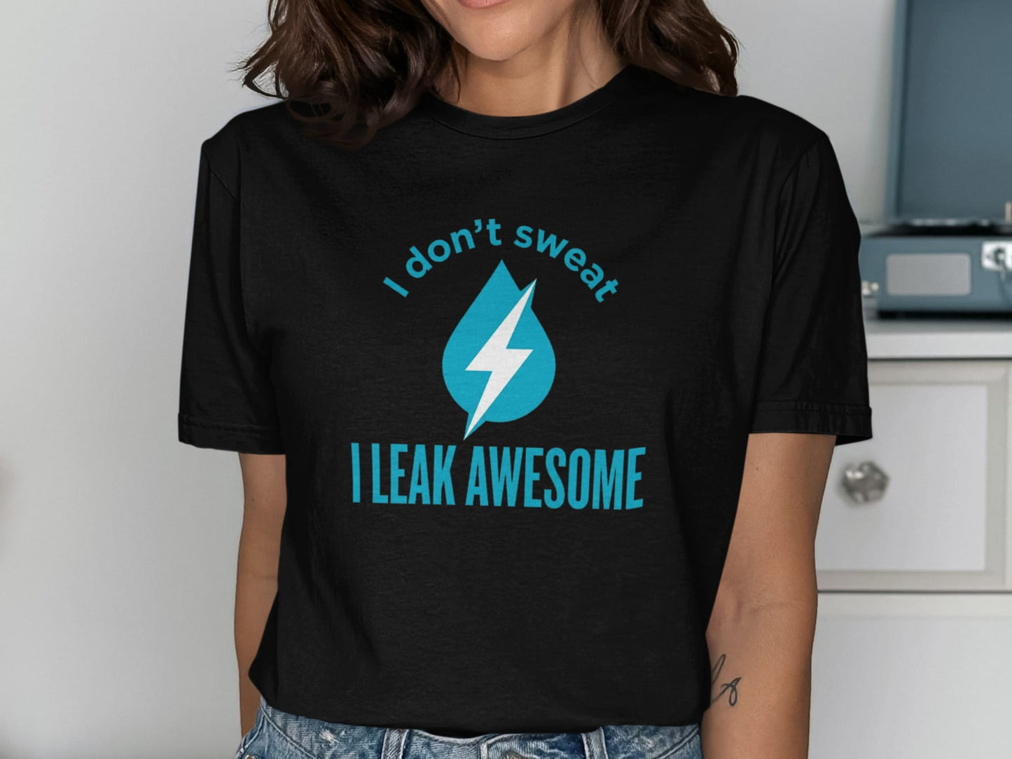 Black t-shirt with a blue water drop and lightning bolt graphic and text.