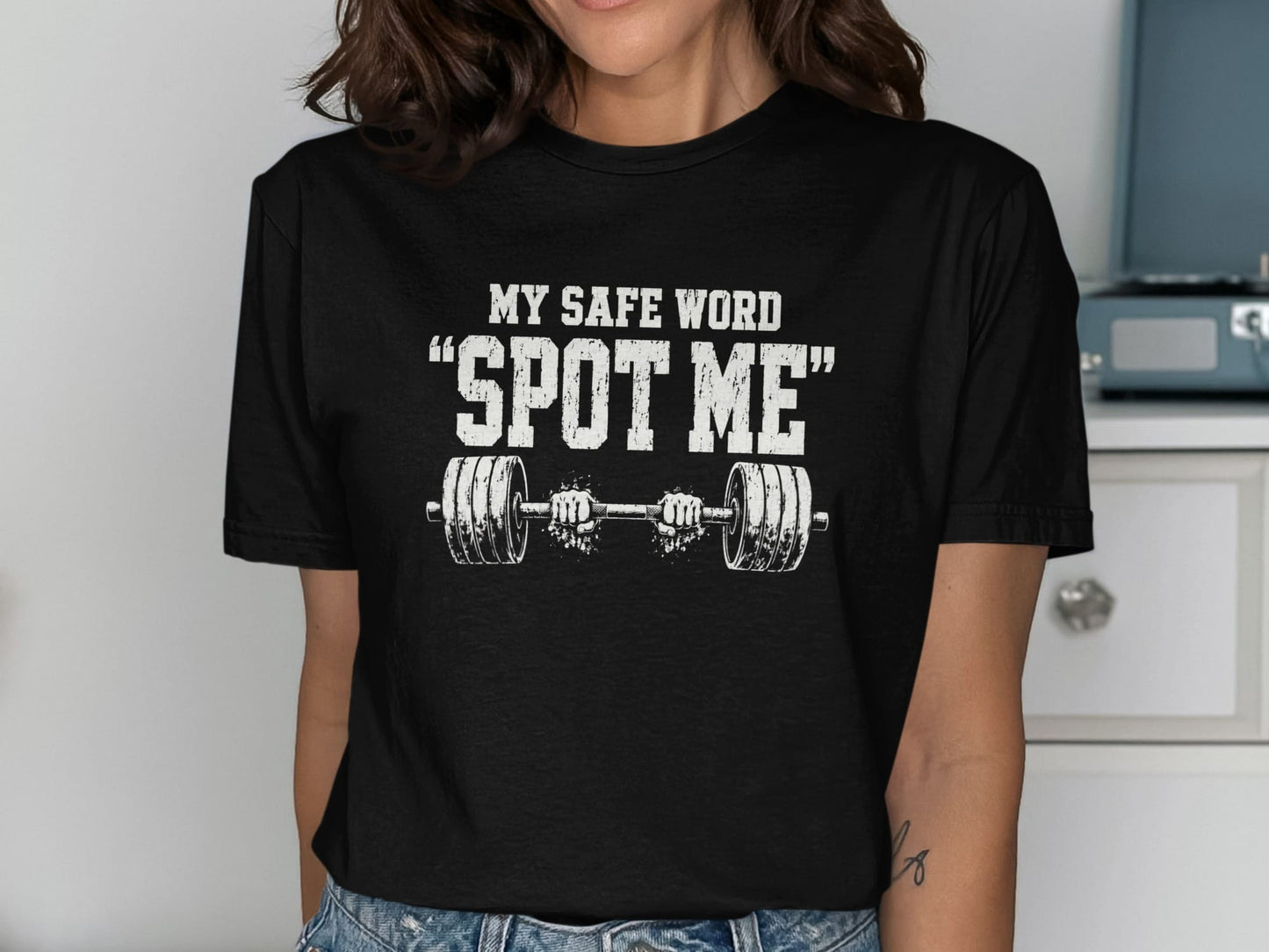 Black t-shirt with "MY SAFE WORD SPOT ME" text and barbell graphic.