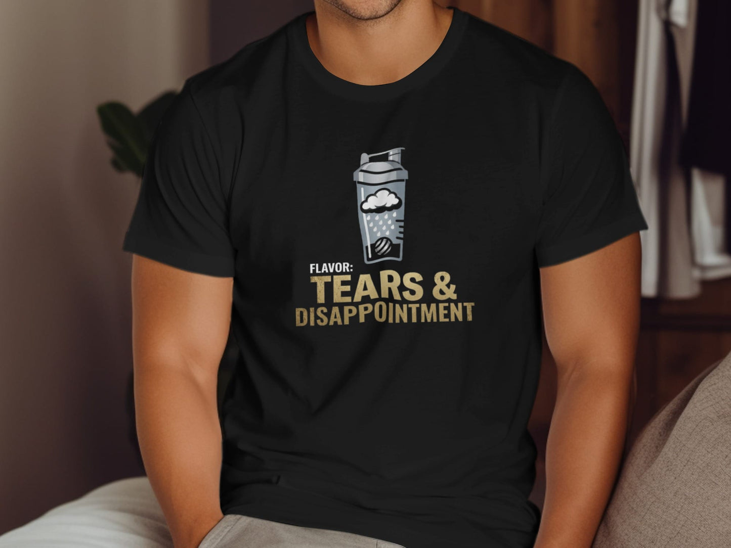 Black t-shirt with "Tears & Disappointment" shaker bottle graphic.