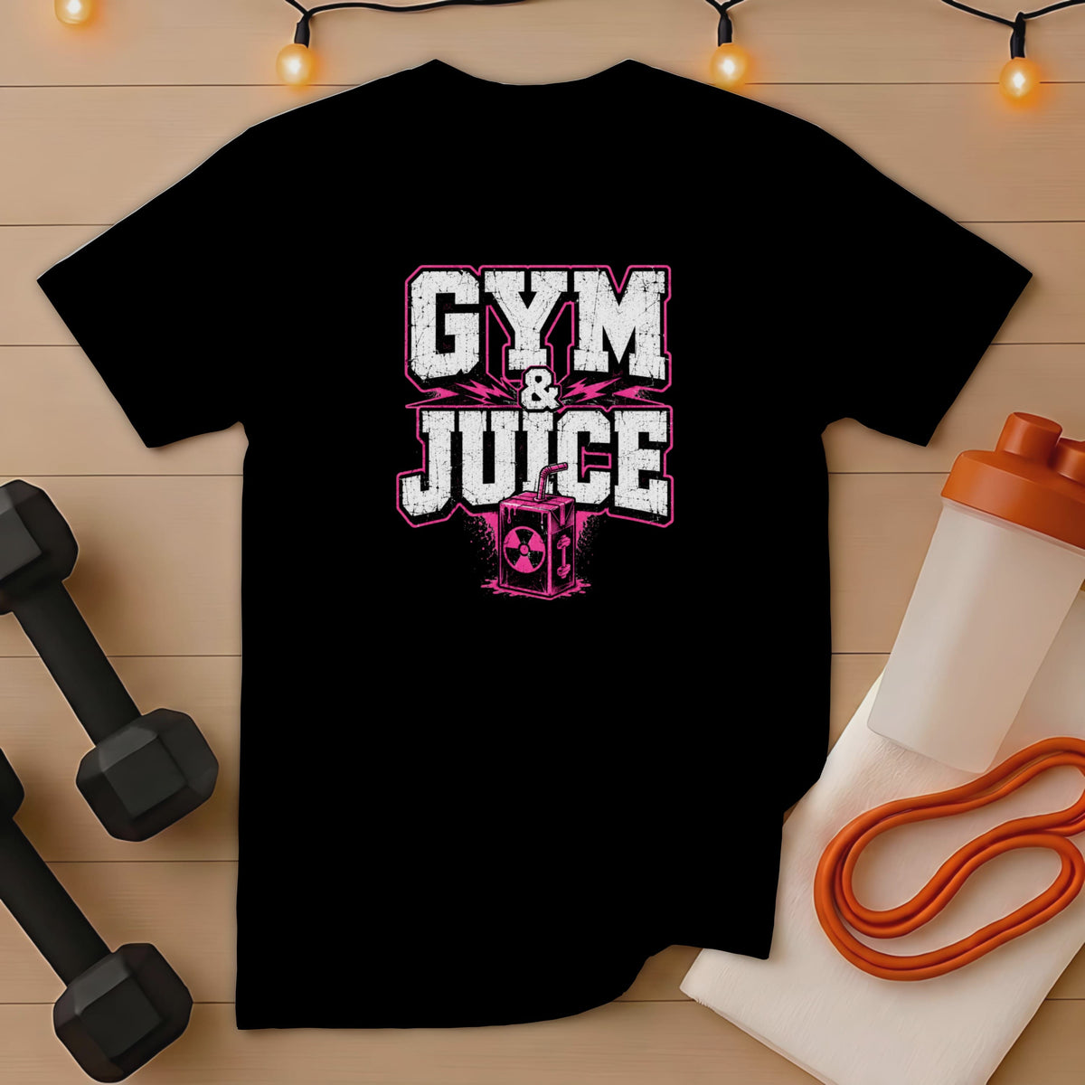 Black t-shirt with "GYM & JUICE" text in distressed pink and white, and a juice box graphic.