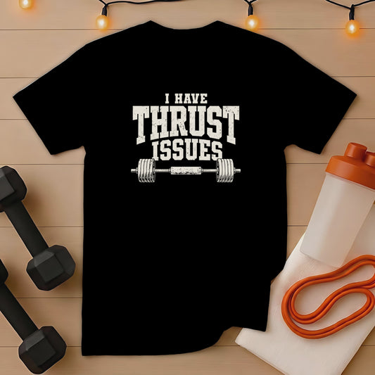 Black t-shirt with "I HAVE THRUST ISSUES" text and barbell graphic.