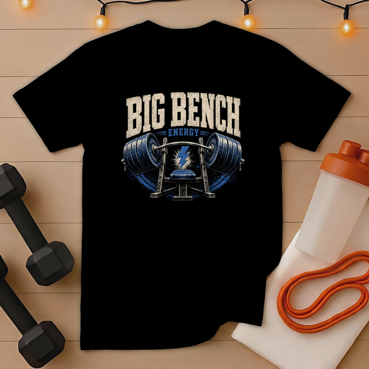 Black t-shirt with "BIG BENCH ENERGY" and barbell graphic.