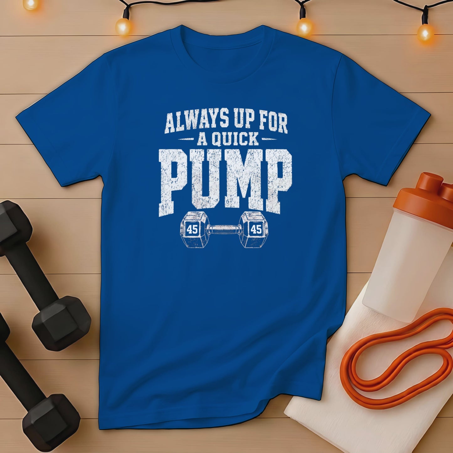 Blue t-shirt with "Always up for a quick pump" text and dumbbell graphic.
