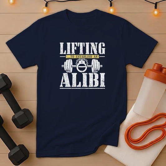 Navy t-shirt with "Lifting ...to establish an ALIBI" text and barbell with handcuffs graphic.