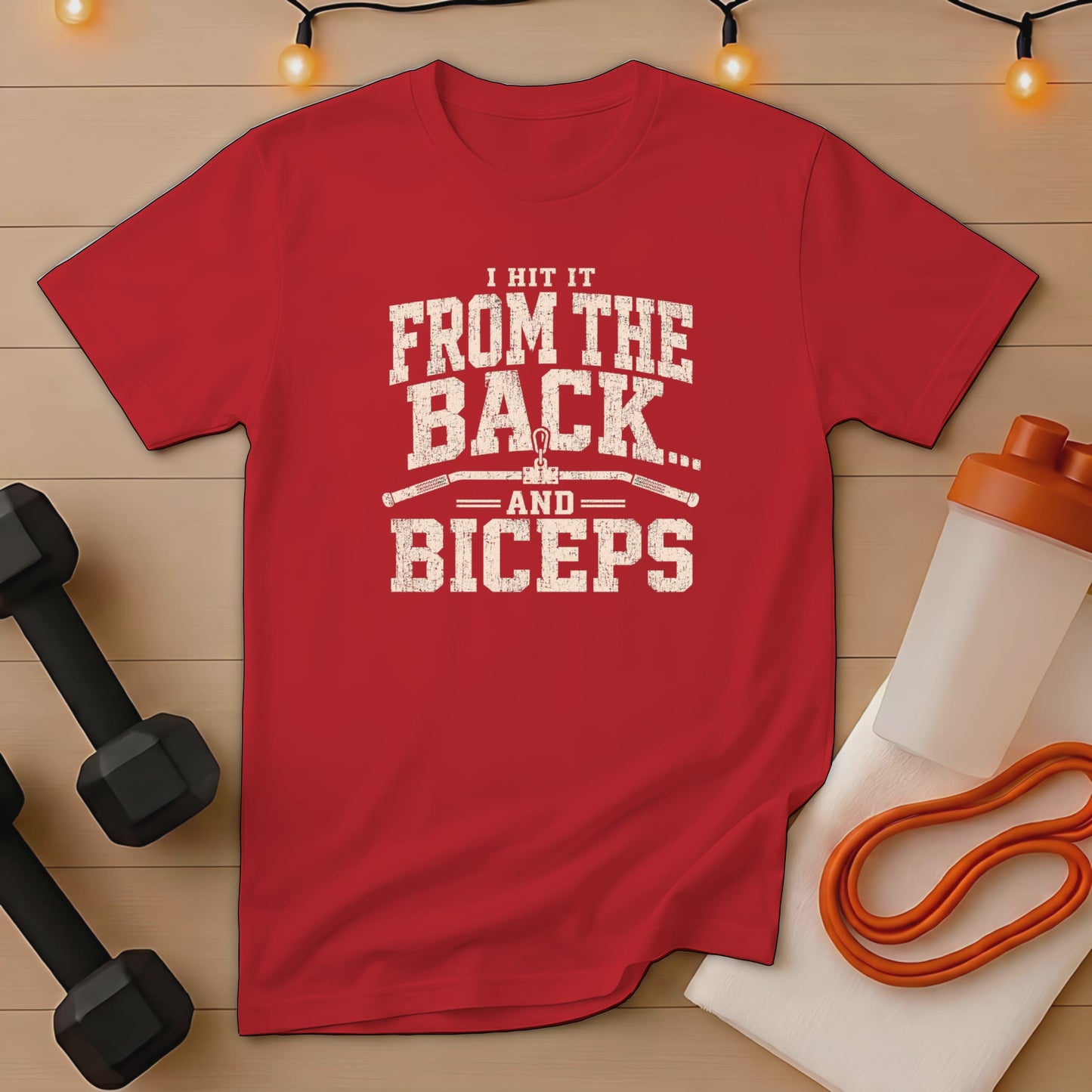 Red t-shirt with distressed text "I hit it from the back... and biceps".