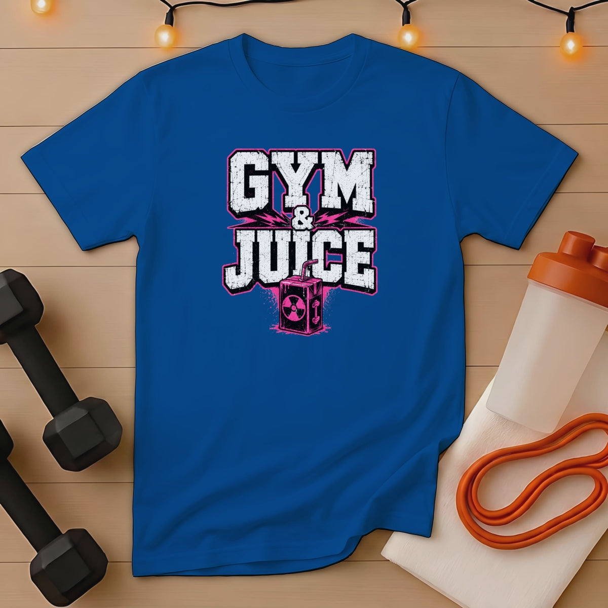 Blue t-shirt with "GYM & JUICE" text and a radioactive juice box graphic.