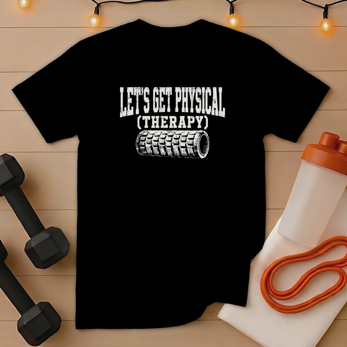 Black t-shirt with white text "LET'S GET PHYSICAL (THERAPY)" and foam roller graphic.