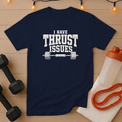 Navy t-shirt with "I HAVE THRUST ISSUES" text and barbell graphic.