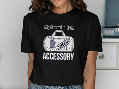Black t-shirt with a graphic of a gym bag and the text "My Favorite Gym Accessory."