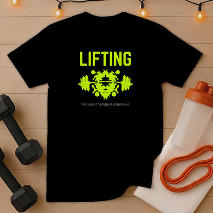 Black t-shirt with "LIFTING" and barbell design, "because therapy is expensive" text below.