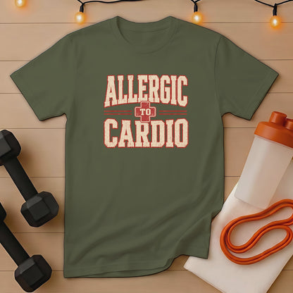 Green t-shirt with "Allergic to Cardio" text, dumbbells, and resistance band.