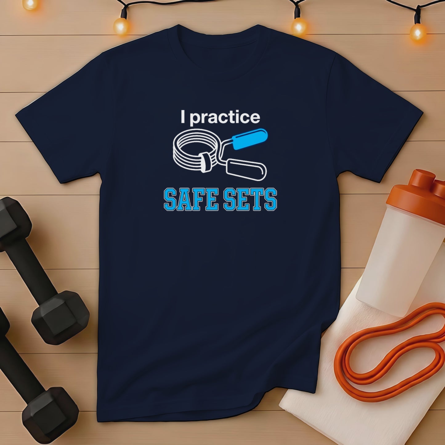 Navy t-shirt with "I practice SAFE SETS" text and weightlifting accessories.