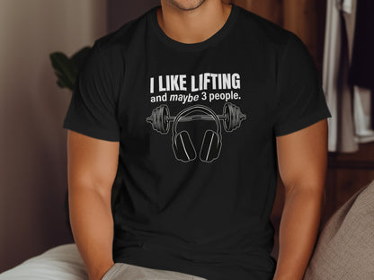 Black t-shirt with "I LIKE LIFTING and maybe 3 people" and barbell headphones design.