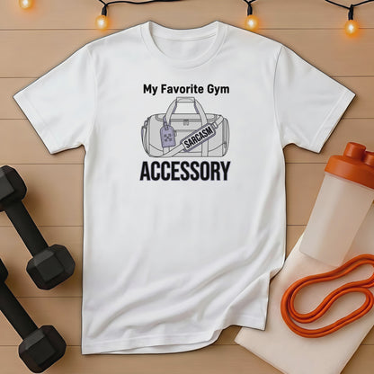 White t-shirt with "My Favorite Gym Accessory" and a luggage tag reading "SARCASTIC".