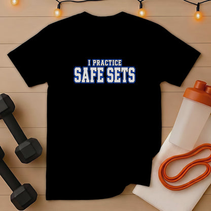 Black t-shirt with "I PRACTICE SAFE SETS" text, dumbbells, and workout accessories.