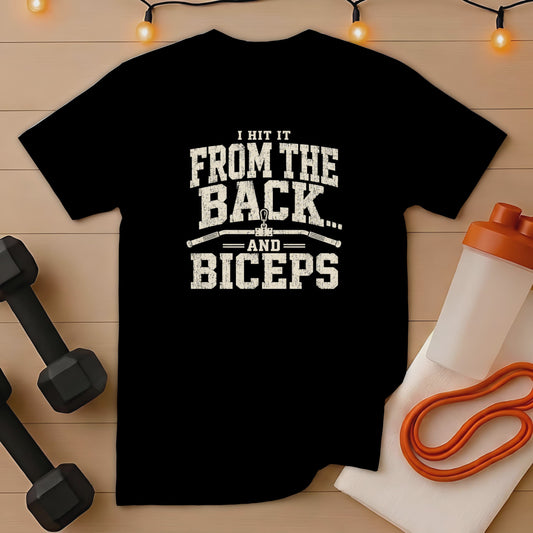 Black t-shirt with distressed text "I HIT IT FROM THE BACK... AND BICEPS".