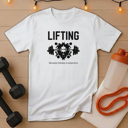 White t-shirt with "LIFTING" and barbell inkblot, workout accessories nearby.