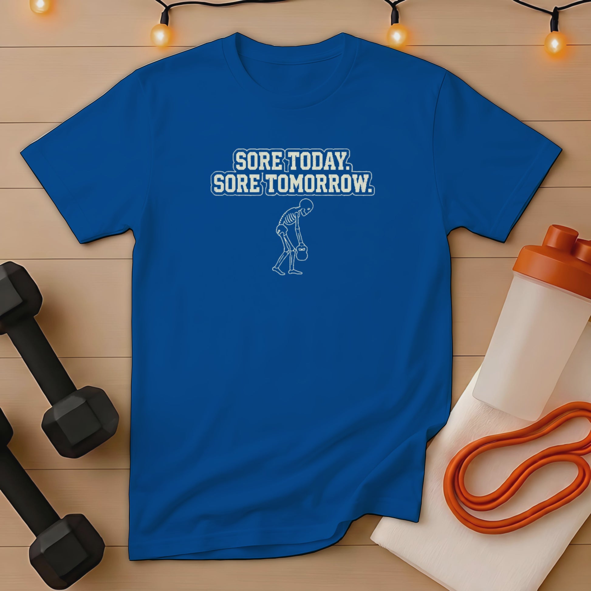 Blue t-shirt with "Sore Today, Sore Tomorrow" text and skeleton graphic.