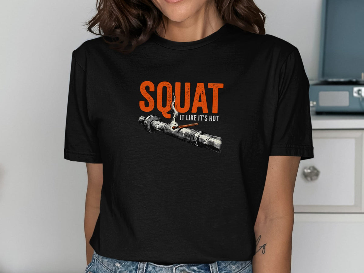 Black t-shirt with orange text "SQUAT IT LIKE IT'S HOT" and a lit match.