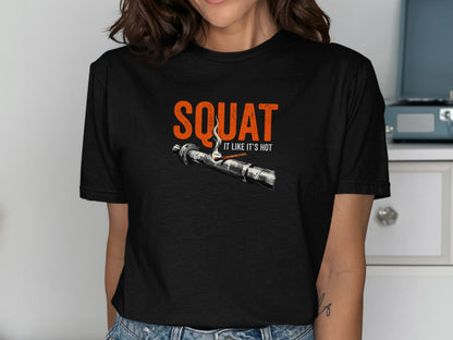 Black t-shirt with orange text "SQUAT IT LIKE IT'S HOT" and a lit match.