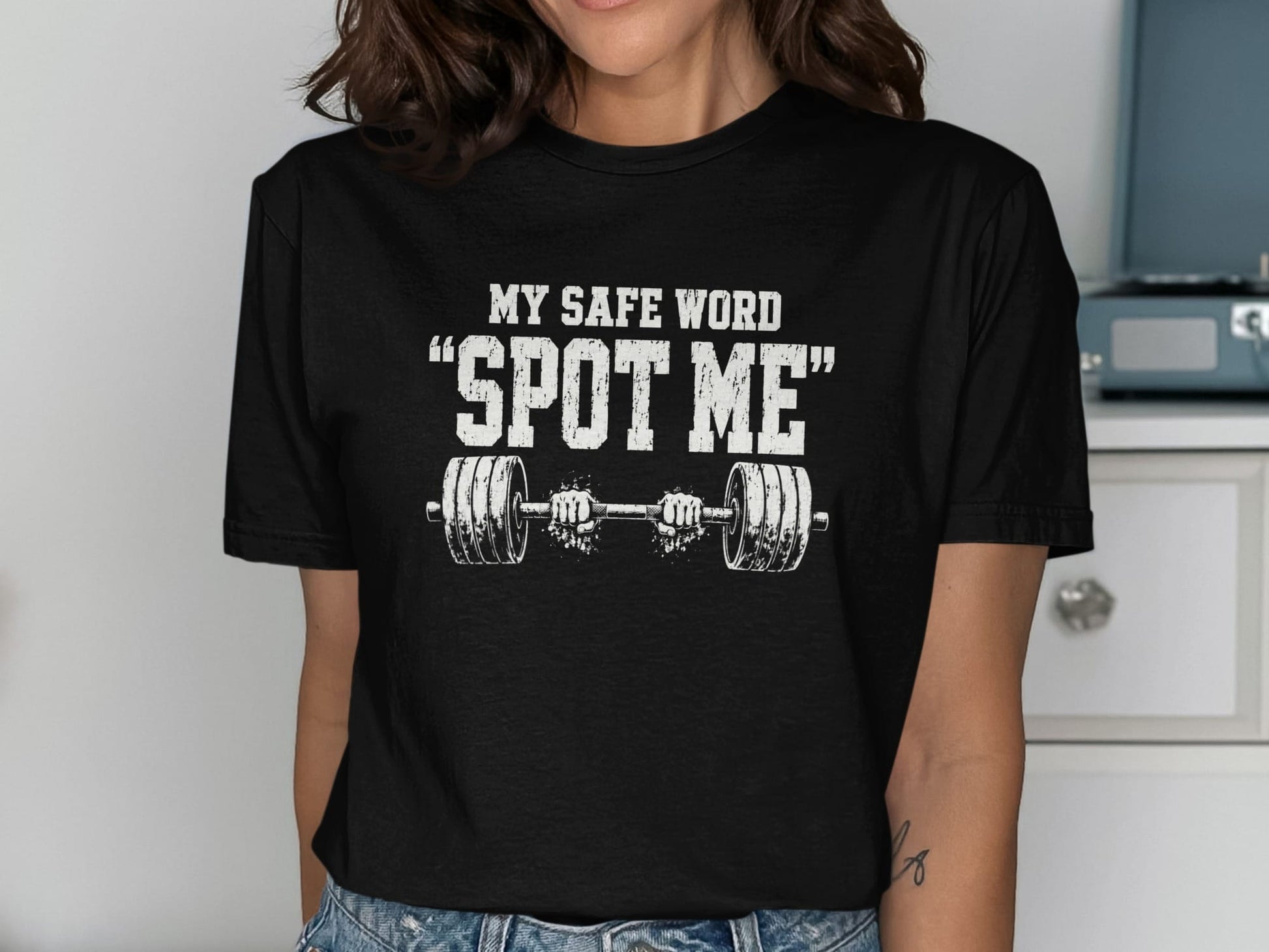 Black t-shirt with "MY SAFE WORD SPOT ME" text and barbell graphic.
