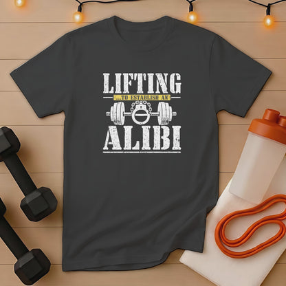 Gray t-shirt with text "Lifting ...to establish an alibi" with dumbbells and handcuffs.