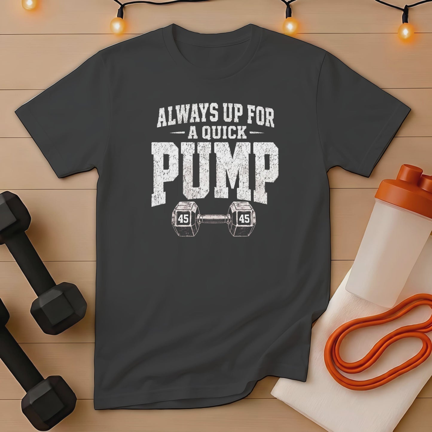 Dark gray t-shirt with distressed text "ALWAYS UP FOR A QUICK PUMP" and dumbbells.