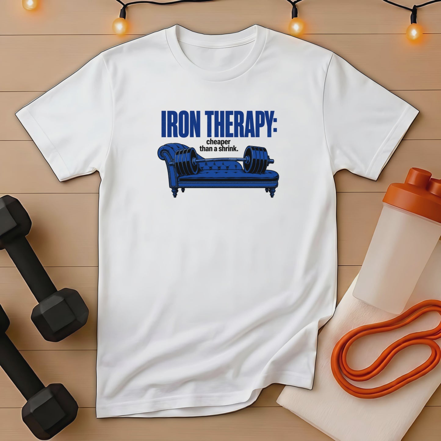 White t-shirt with "Iron Therapy: cheaper than a shrink" text and barbell graphic.