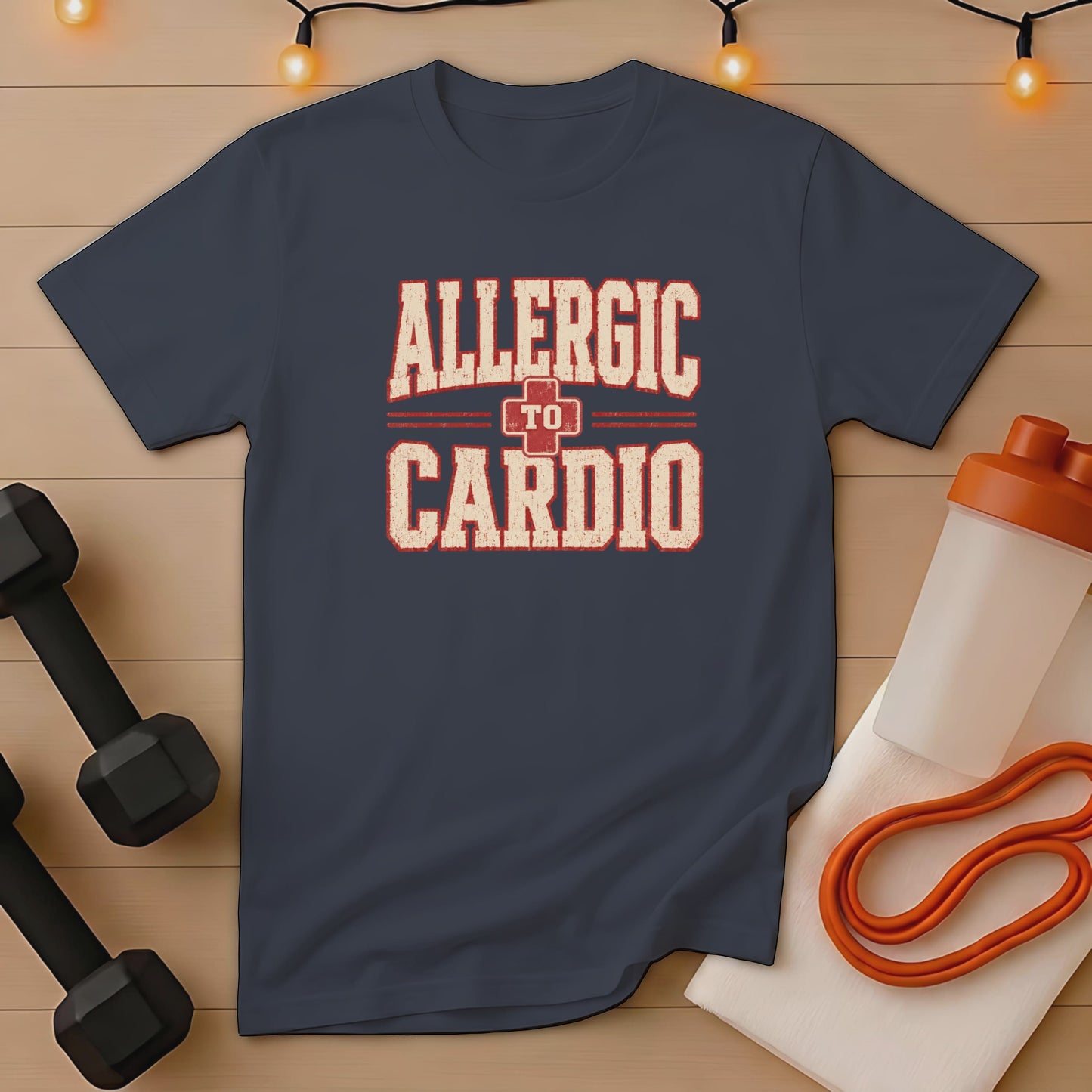 Navy t-shirt with distressed text "ALLERGIC TO CARDIO" and workout accessories.
