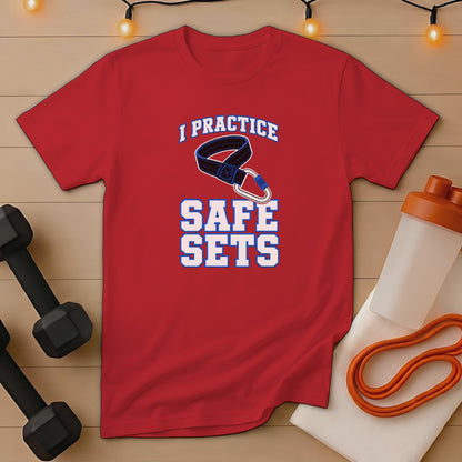Red t-shirt with "I PRACTICE SAFE SETS" text and barbell clamp graphic.