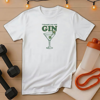 White t-shirt with "I thought you said gin" text and martini glass graphic.