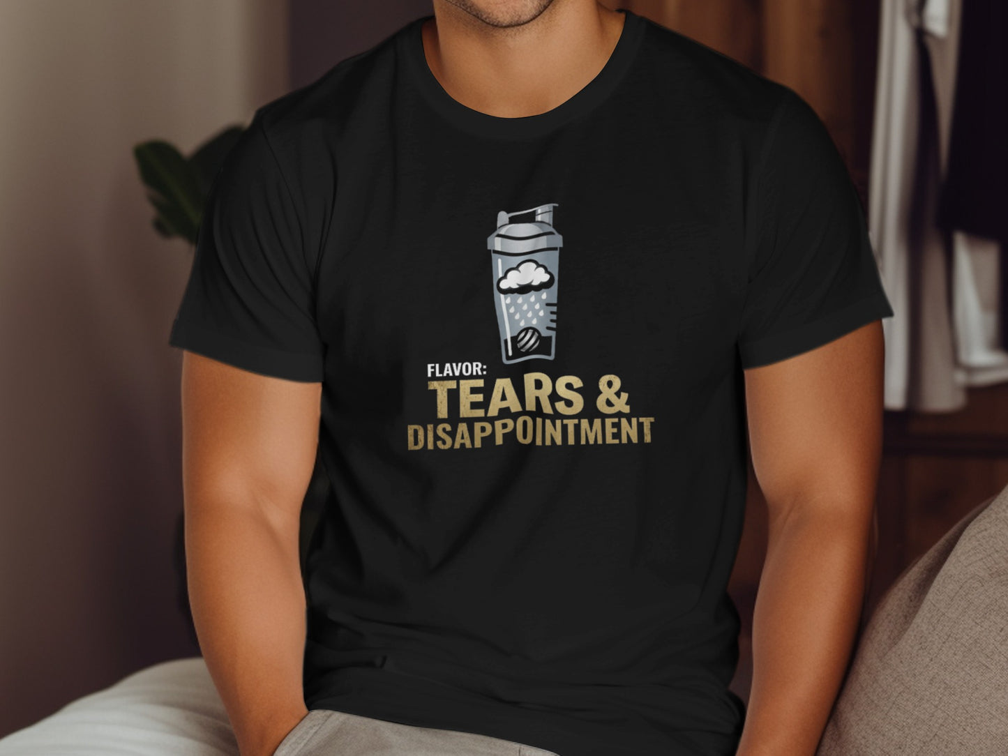 Black t-shirt with "Tears & Disappointment" shaker bottle graphic.