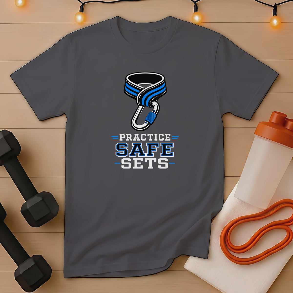 Dark gray t-shirt with "PRACTICE SAFE SETS" text and carabiner logo.