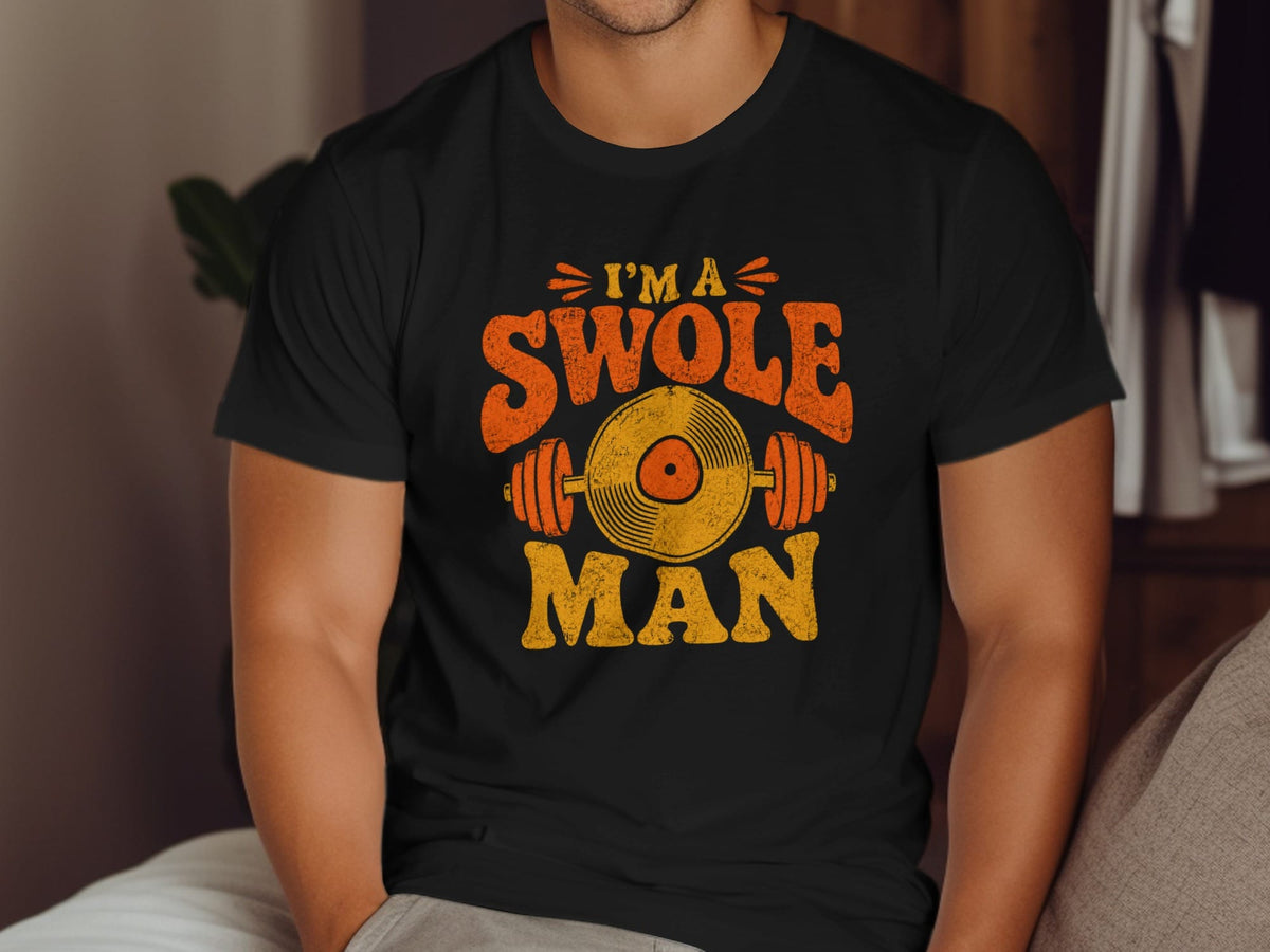 T-shirt graphic with text "I'm a Swole Man" and barbell and record imagery.
