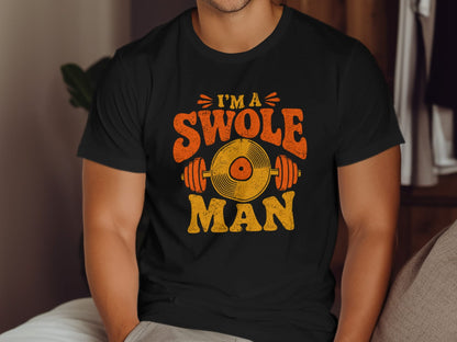 T-shirt graphic with text "I'm a Swole Man" and barbell and record imagery.