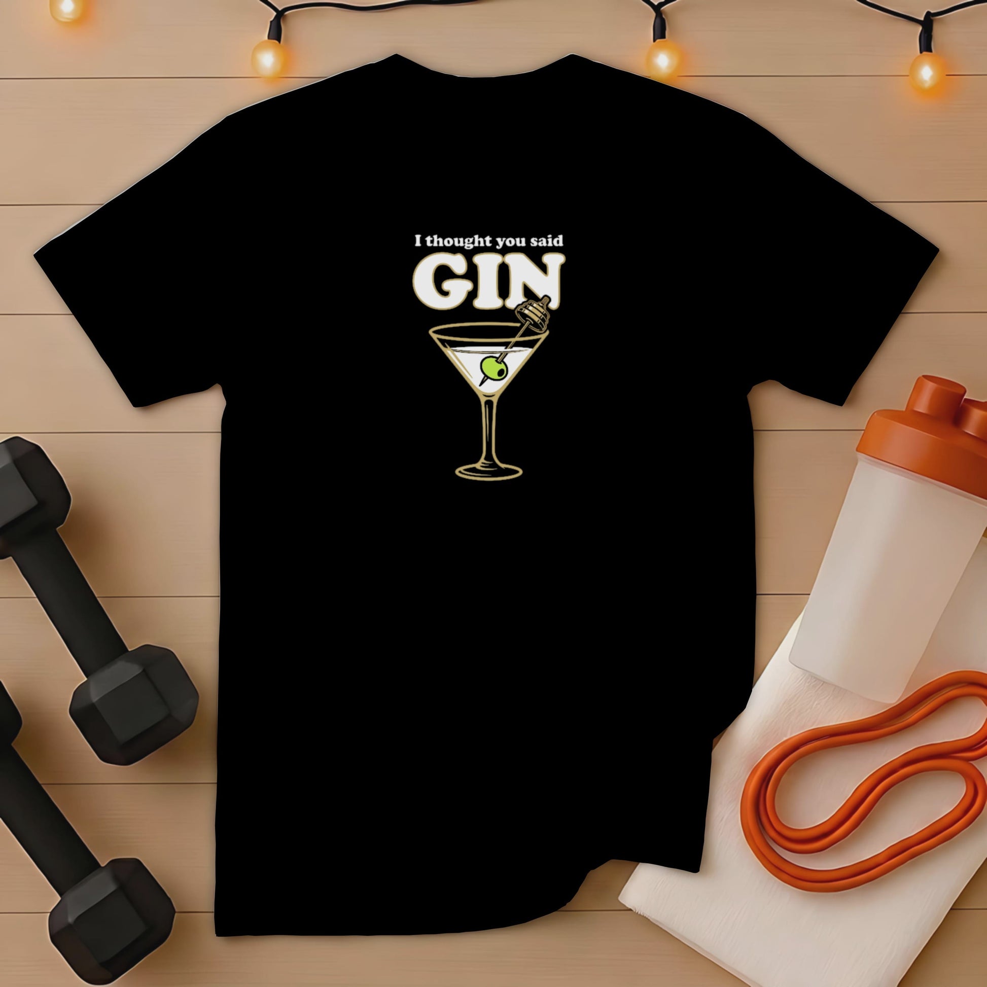 Black t-shirt with "I thought you said GIN" and martini glass graphic.