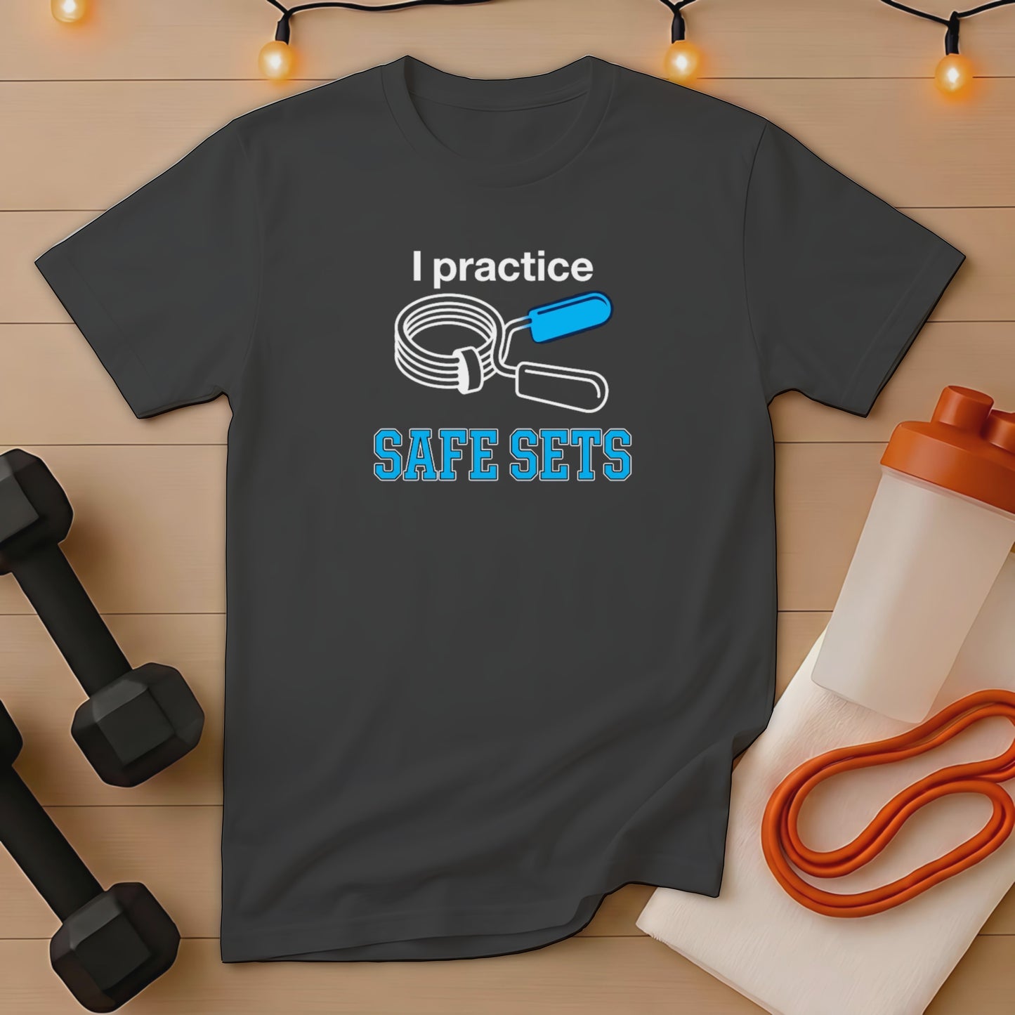 Dark t-shirt with "I practice SAFE SETS" text and gym equipment.