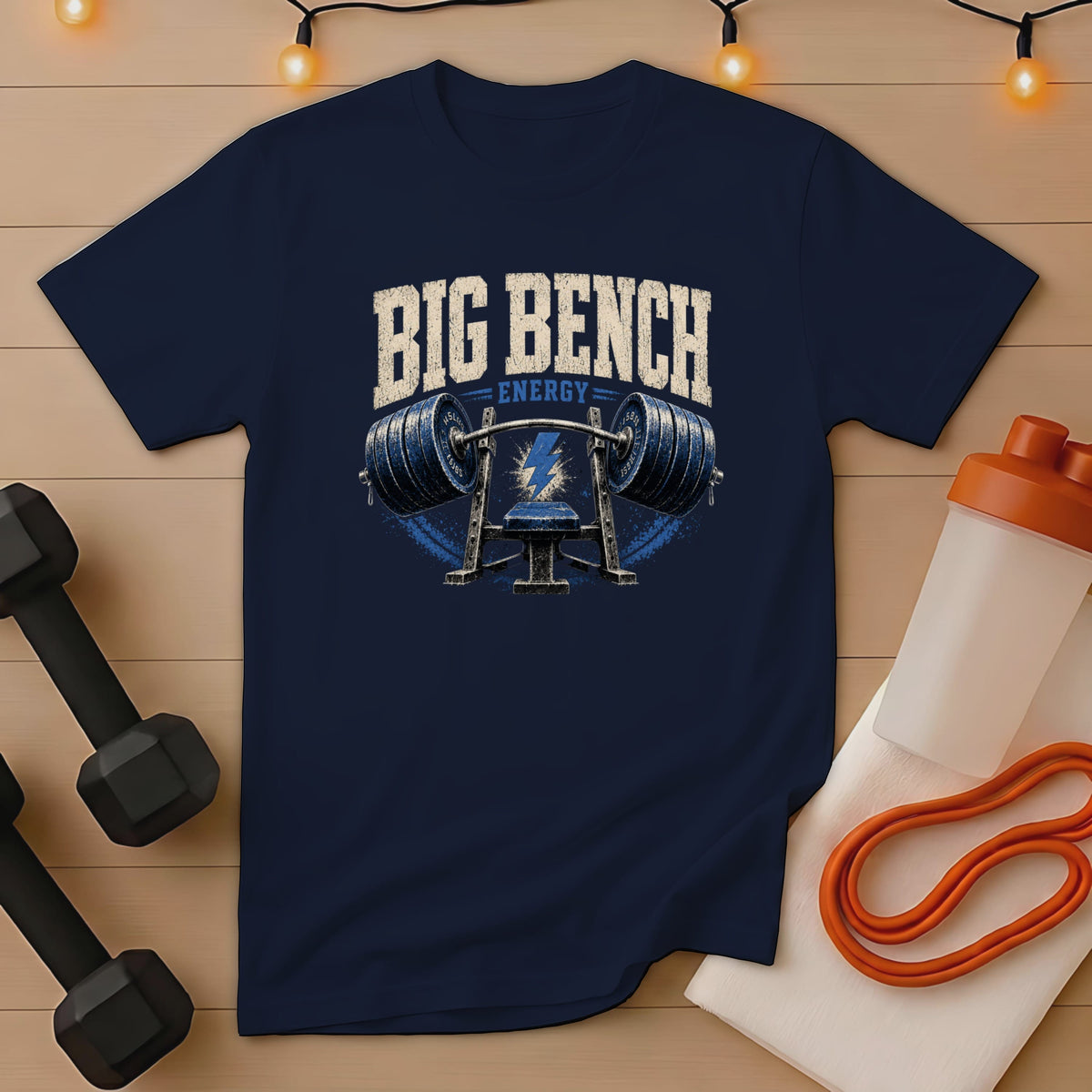 Navy t-shirt with "BIG BENCH ENERGY" text and barbell graphic.