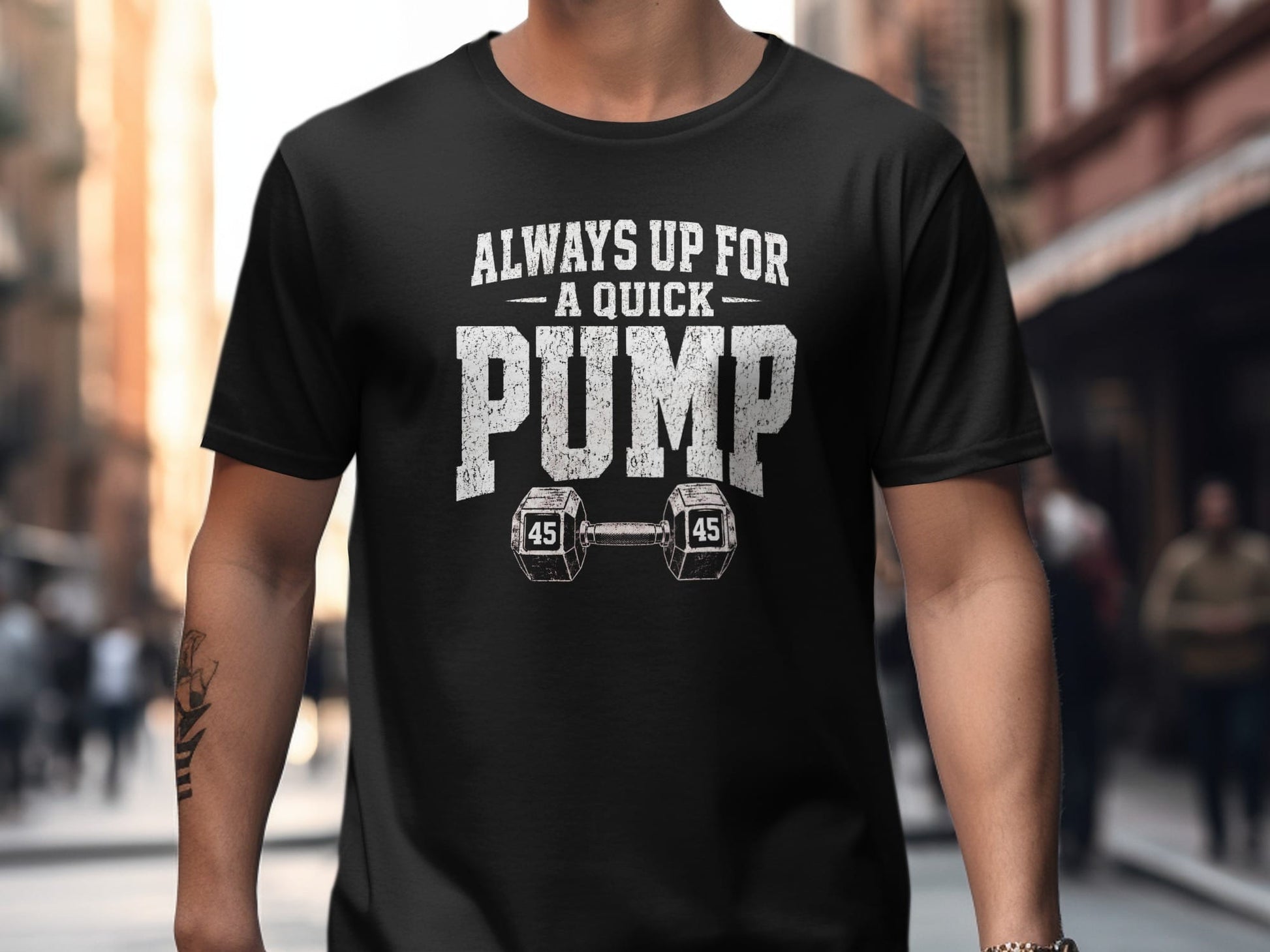 Black t-shirt with "Always Up For A Quick Pump" and dumbbells.