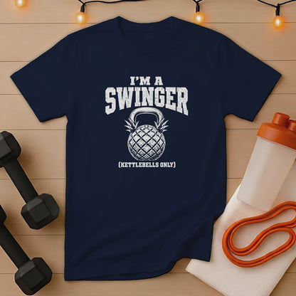 Navy t-shirt with "I'm a Swinger (Kettlebells Only)" text and pineapple kettlebell graphic.