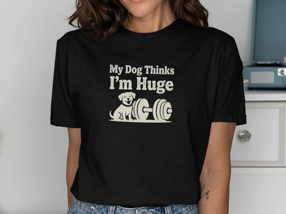 Black t-shirt with "My Dog Thinks I'm Huge" and a cartoon dog next to a dumbbell.