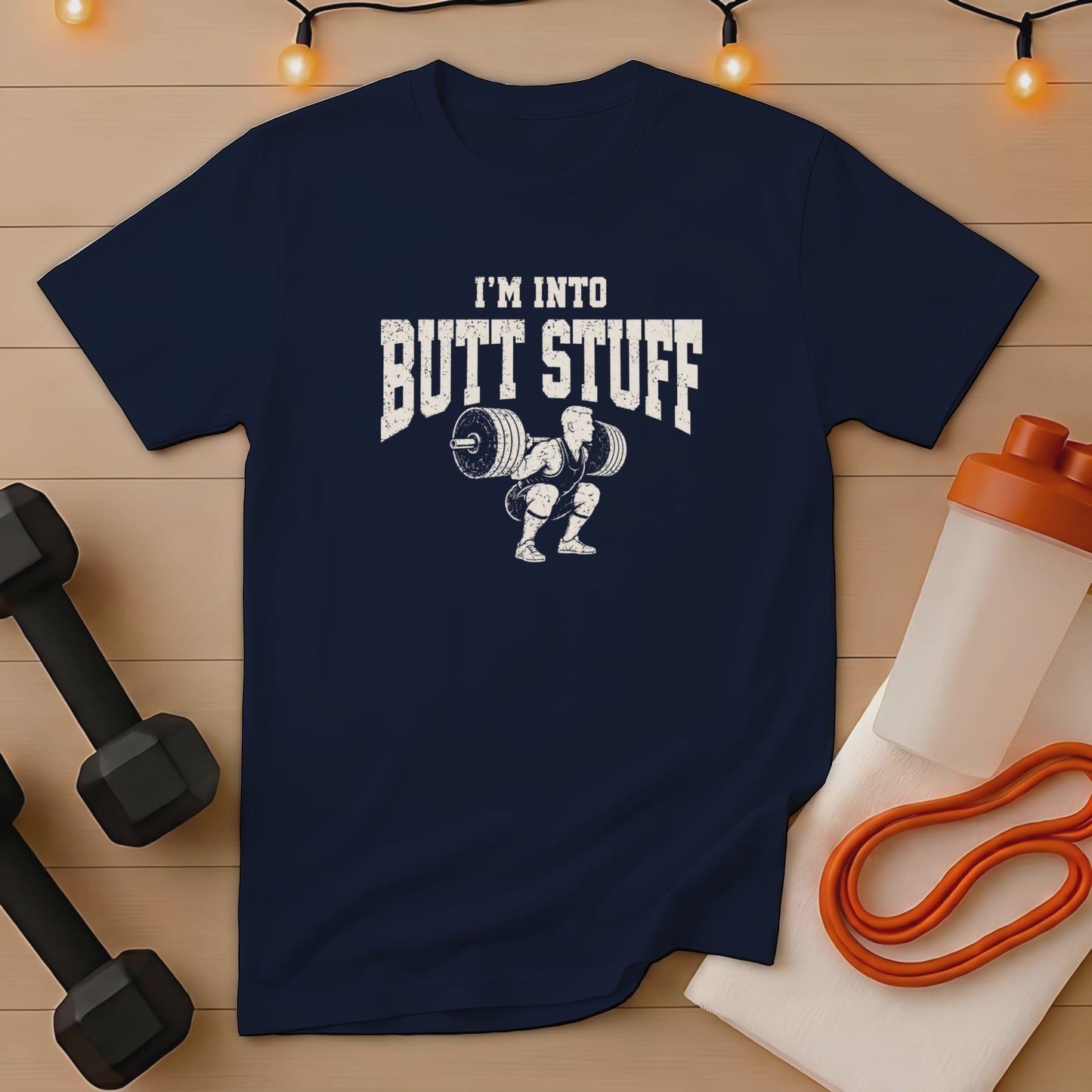 Navy t-shirt with "I'M INTO BUTT STUFF" and barbell squat graphic.
