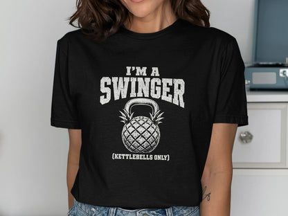Black t-shirt with distressed white text "I'M A SWINGER (KETTLEBELLS ONLY)" and a kettlebell.