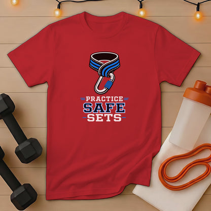 Red t-shirt with "PRACTICE SAFE SETS" text and carabiner graphic.