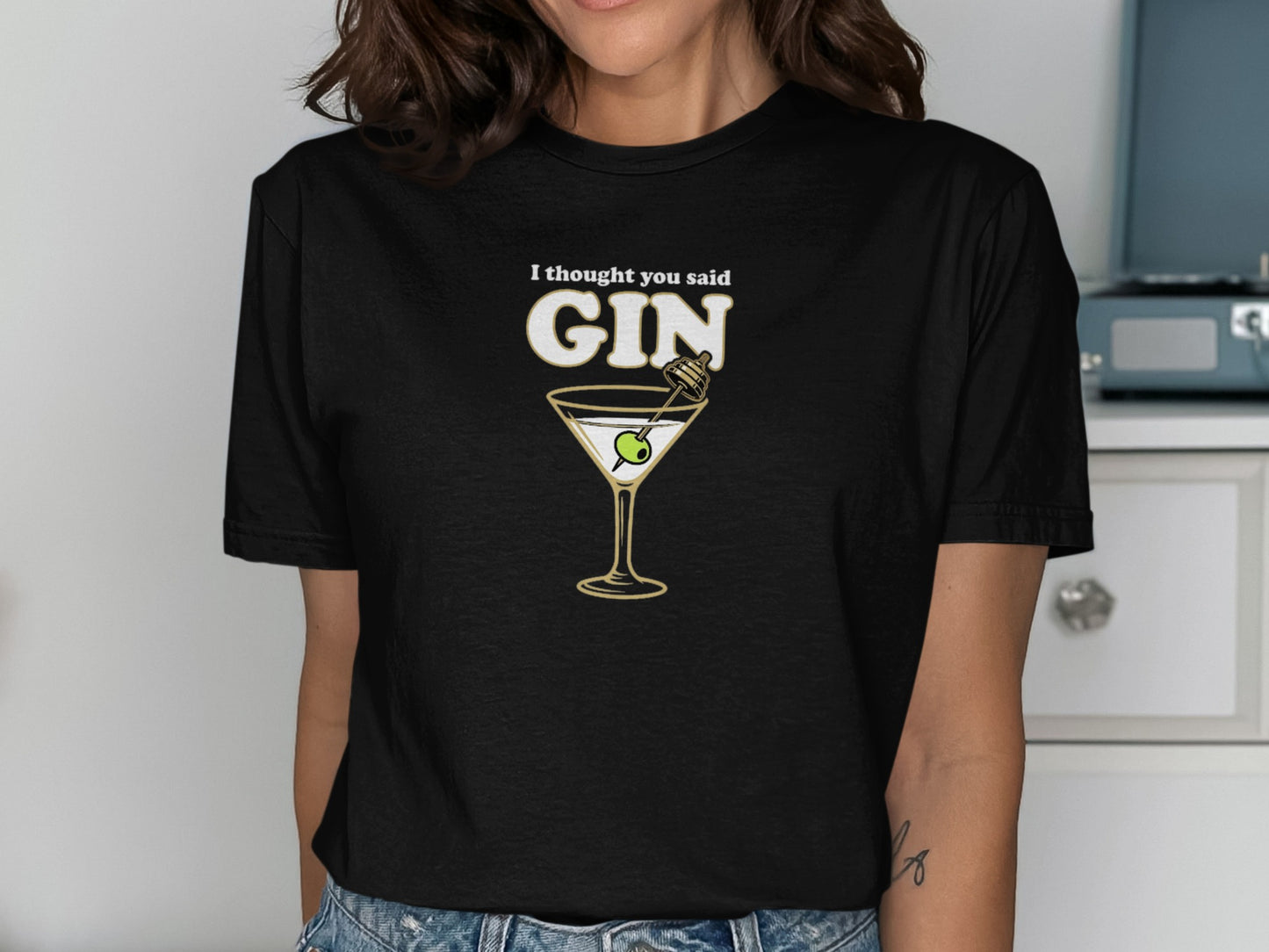 Black t-shirt with "I thought you said GIN" and a martini glass graphic.