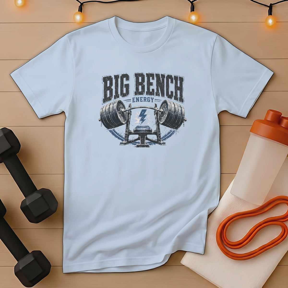 White t-shirt with "Big Bench Energy" and weightlifting graphic.