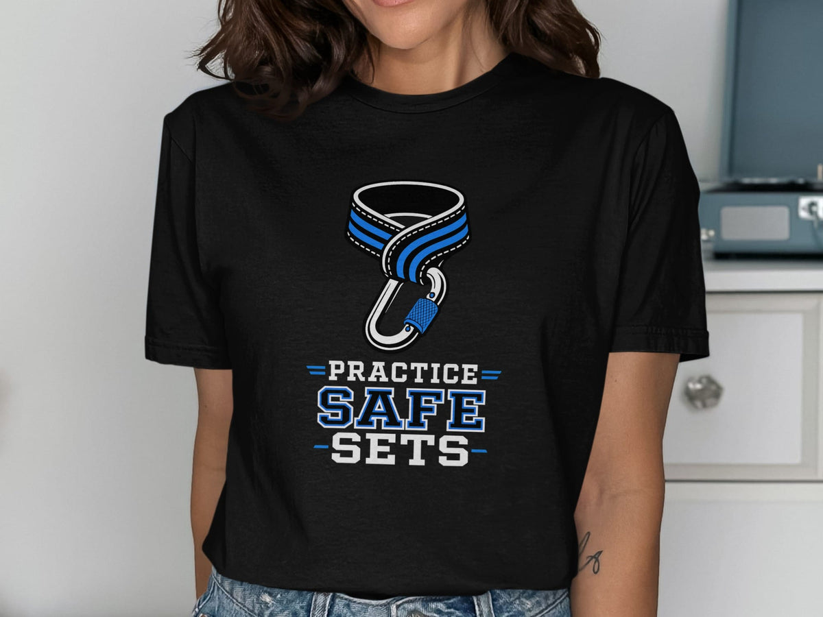 Black shirt with cartoon carabiner graphic and text "PRACTICE SAFE SETS".
