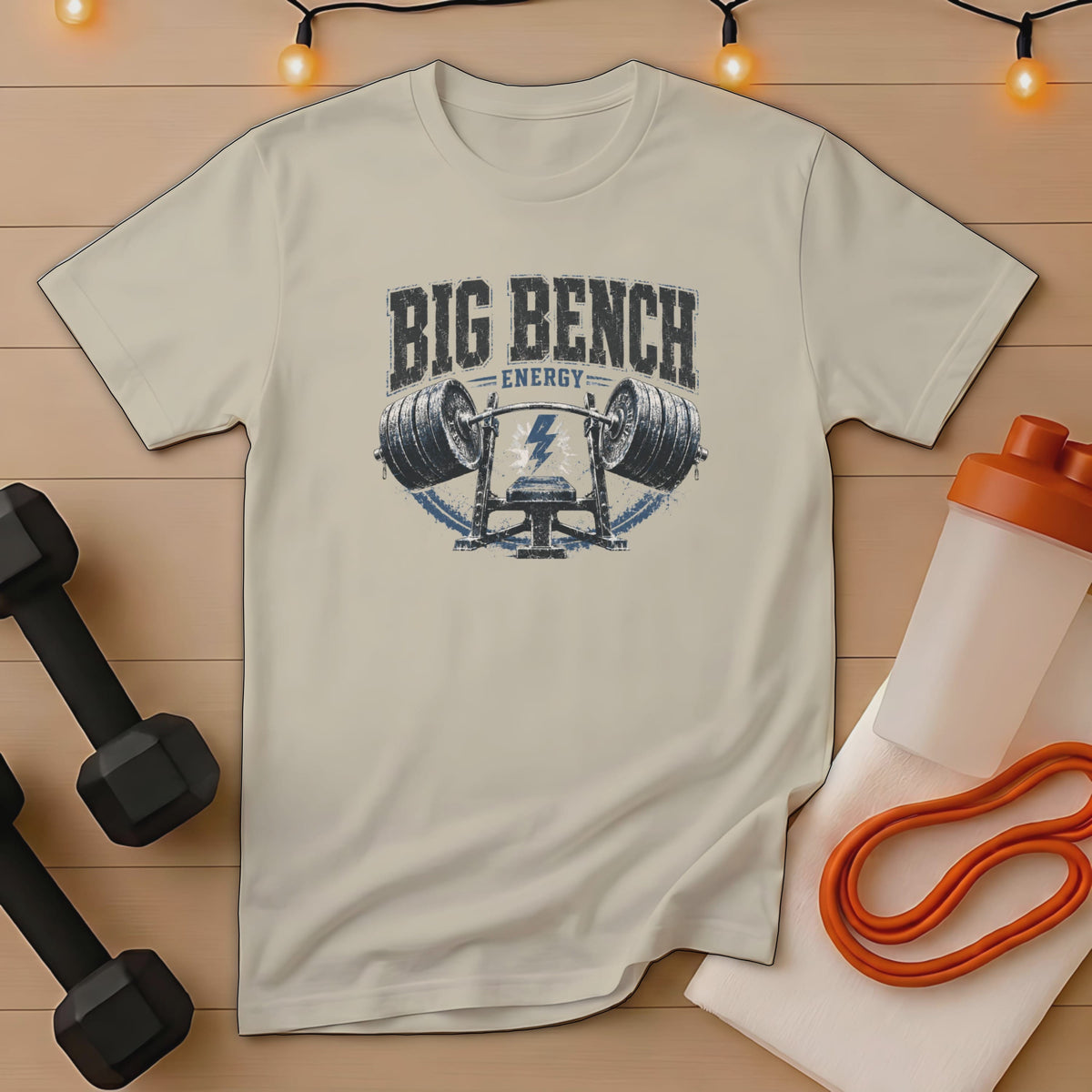 Cream t-shirt with "BIG BENCH ENERGY" and barbell graphic.