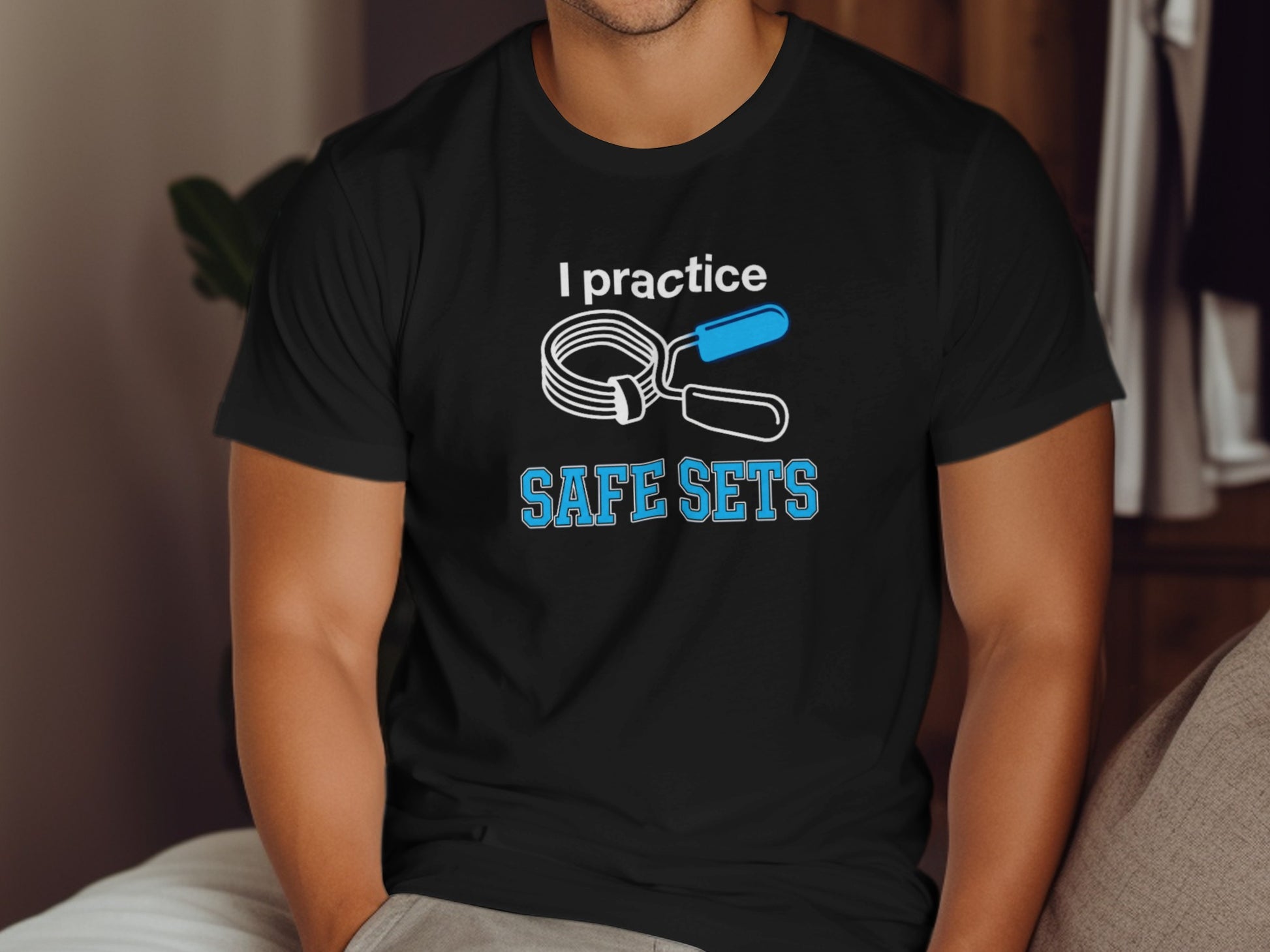 Black t-shirt with "I practice SAFE SETS" and weightlifting clamp graphic.